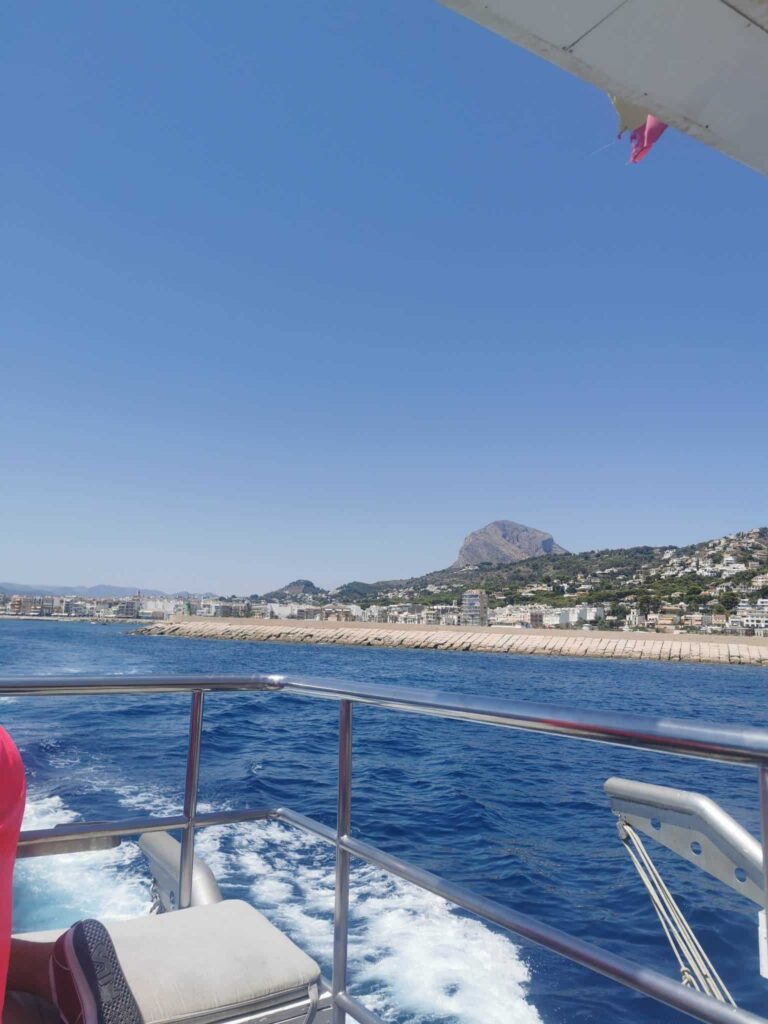 javea port in the distance on a hot, sunny July day while on the javea-denia cruise.