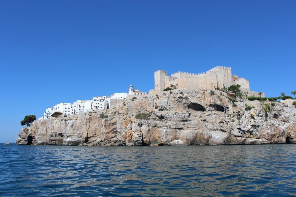 a view of Castellon's Peniscola Castle surrounded by the sea